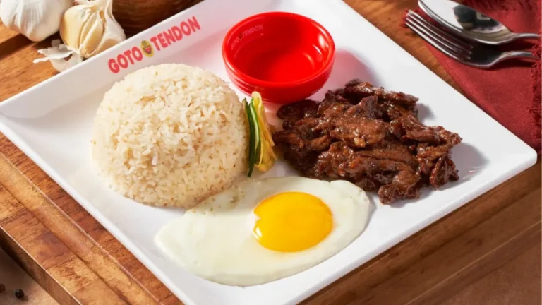 Rice, half boiled egg in a plate, a menu of goto tendon philippines resturant.