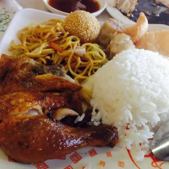 Sweet and Sour chicken Rice Meal in a plate, a menu of Hen Lin Philippines restaurant.