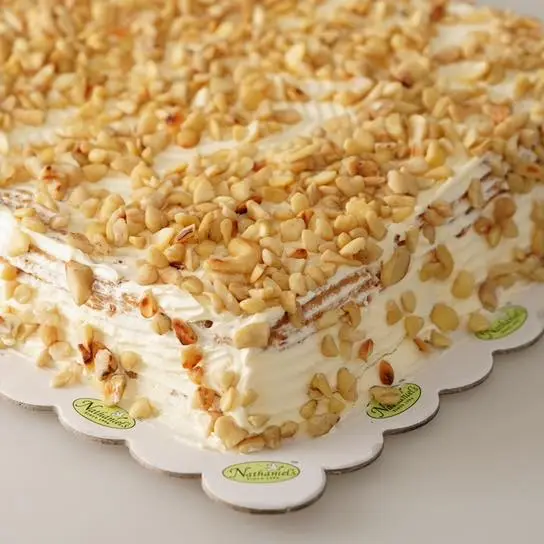 Cake with extra toppings of almonds, a menu of Nathaniel’s Philippines resturant.