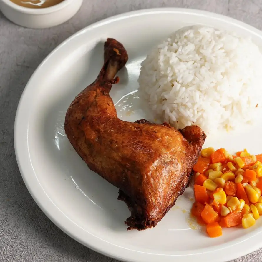 Fried chicken with rice in a plate, a menu of Nathaniel’s Philippines resturant.