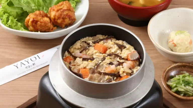 Rice, salad and other food in bowls, a menu of yayoi philippines resturant.